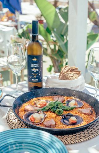 Arroz con vieiras y atún del estrecho